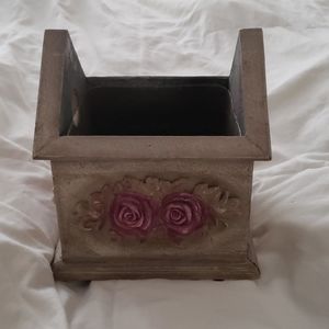 Beautiful wooden planter with rose detail design.